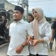 Jalan Kaki, Robinsar Gandeng Istri ke TPS